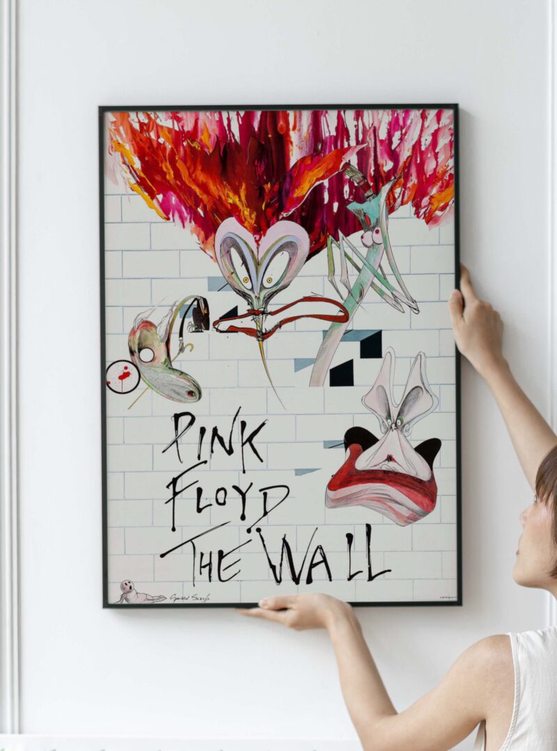 Released in 1979, Pink Floyd's 'The Wall' is a seminal concept album delving into the psychological complexities of its protagonist, Pink. Roger Waters' lyrical prowess and the band's innovative soundscapes drive the narrative, centered on a metaphorical wall constructed by Pink to shield himself from emotional scars. Exploring themes of alienation, war trauma, and the human condition, the album features unforgettable tracks like 'Another Brick in the Wall' and 'Comfortably Numb.' Its cinematic adaptation solidified 'The Wall' as an enduring work in rock history, addressing universal themes with sonic and visual brilliance that transcends generations.
